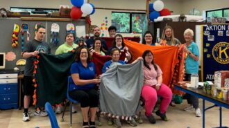 Aktion Club delivers handmade blankets to ECHO shelter