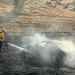 Vehicle fire on Nacimiento Lake Drive spreads to vegetation