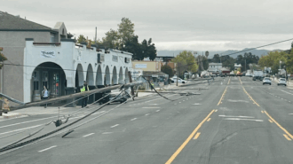 Power pole collapse blocks traffic