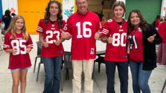 Photo: AACA Students Welcoming Dr. Ledoux at the School Spirit Celebration
