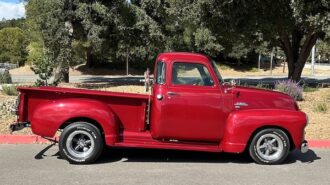 Templeton Library hosts Christmas photo fundraiser with red truck